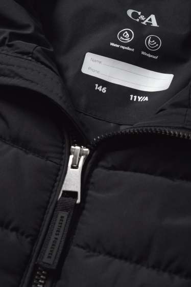 Nena - Jaqueta embuatada amb caputxa - resistent a l’aigua - negre