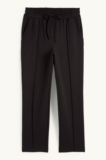 Dona - Pantalons de punt - mid waist - tapered fit - negre
