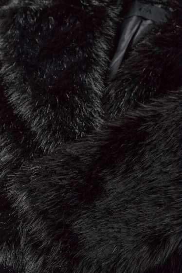Femmes - Veste en imitation fourrure - noir