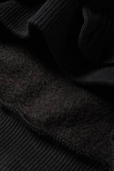 Nena - Os de peluix - dessuadora nadalenca - negre