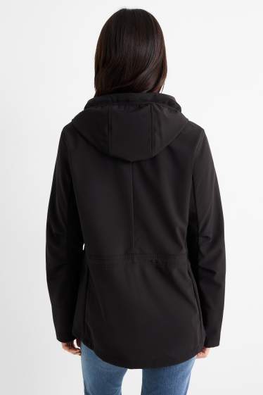 Donna - Giacca soft shell con cappuccio - idrorepellente - 4 Way Stretch - nero