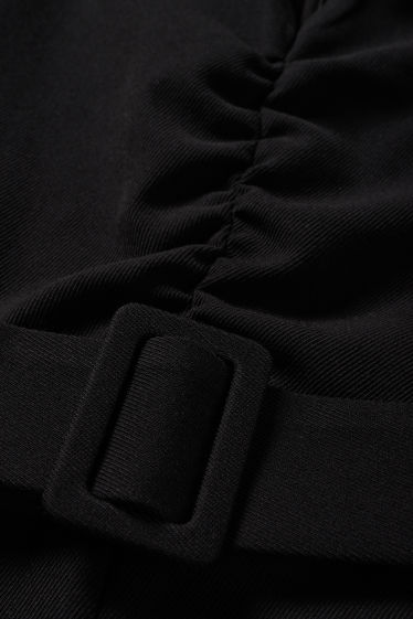 Damen - Jumpsuit mit Gürtel - schwarz