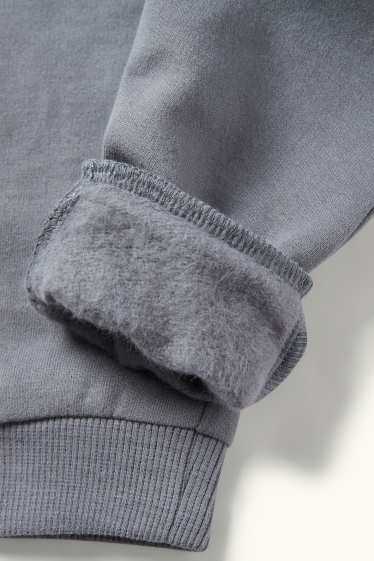 Miminka - chlapci - Medvídek koala - teplákové kalhoty pro miminka - šedá