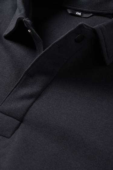 Hommes - Polo à manches longues - regular fit - noir