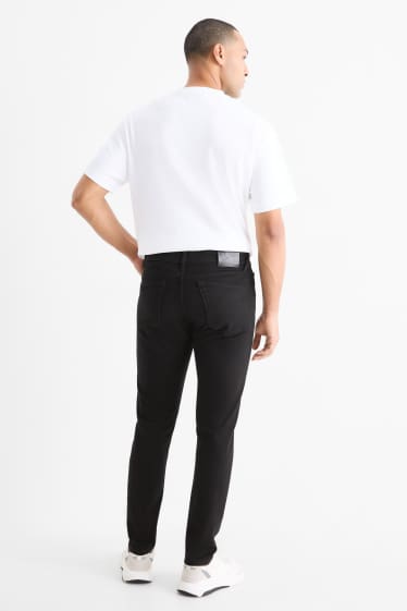 Bărbați - Slim tapered jeans - negru