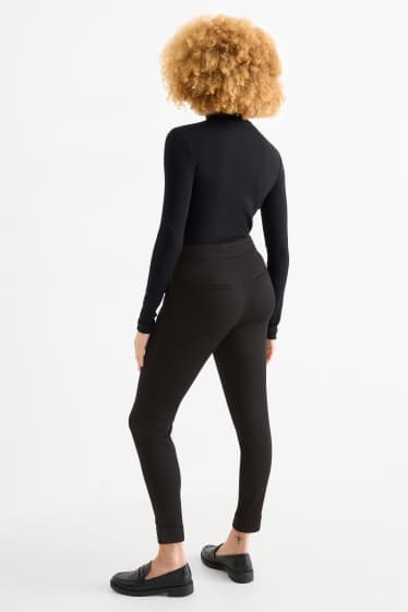 Femmes - Pantalon en jersey - mid waist - tapered fit - noir