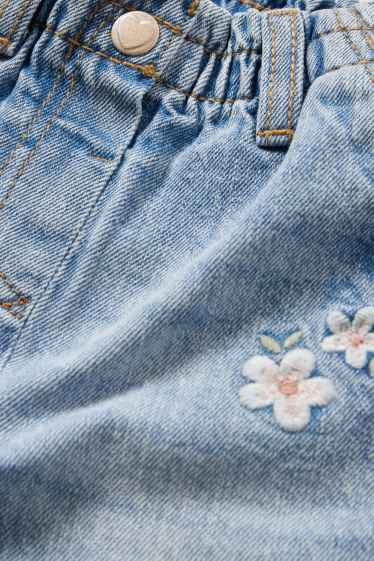Bébés filles - Petites fleurs - jean bébé - jean bleu clair