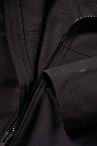 Hommes - Veste à coquille souple avec capuche - déperlante - noir