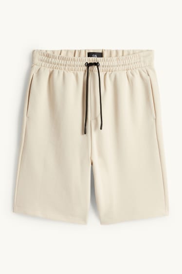 Bărbați - Pantaloni scurți de trening - structurați - bej deschis