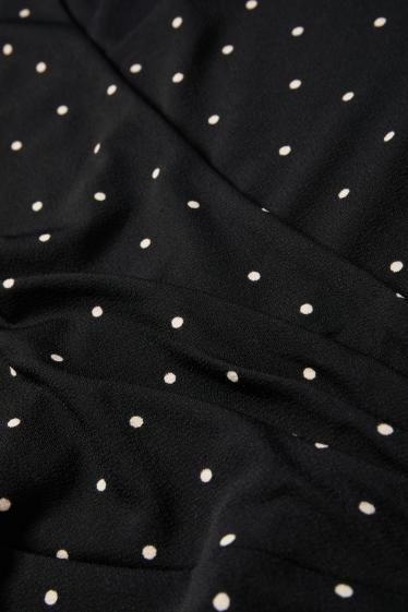 Damen - Kleid mit V-Ausschnitt - Straight Fit - gepunktet - schwarz