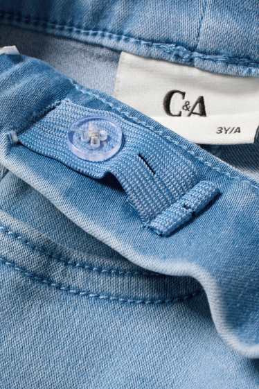 Copii - Fete - Minnie Mouse - flared jeans - aspect lucios - albastru deschis