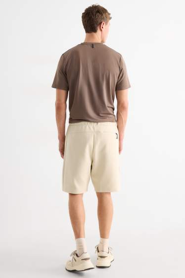 Bărbați - Pantaloni scurți de trening - structurați - bej deschis