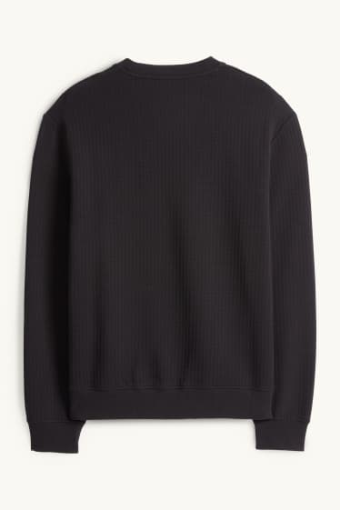 Home - Dessuadora - texturada - negre