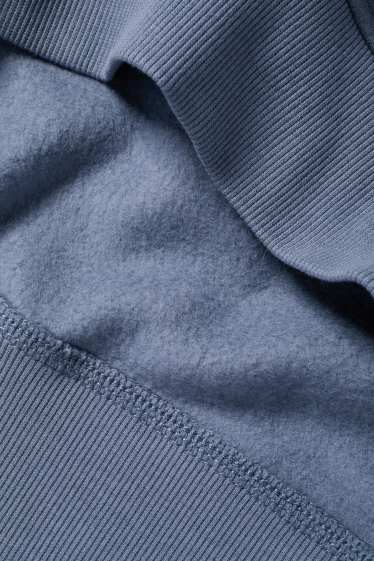 Home - Dessuadora oversized amb caputxa - blau