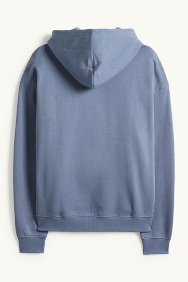 Home - Dessuadora oversized amb caputxa - blau