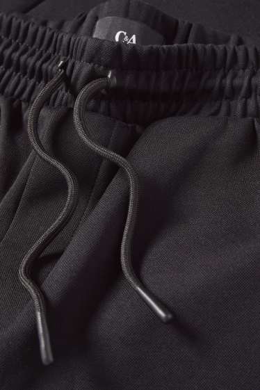 Bărbați - Pantaloni scurți de trening - structurați - negru