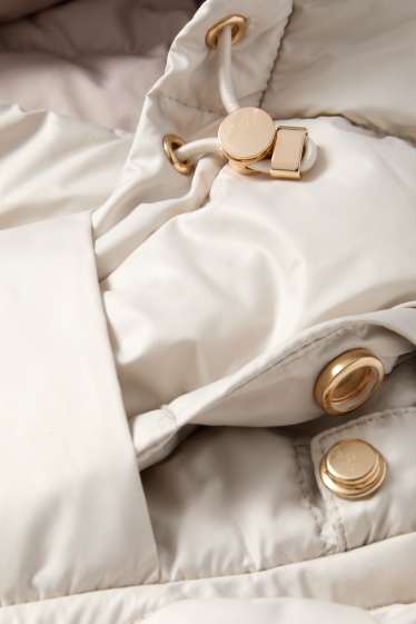 Dona - Jaqueta embuatada amb caputxa - gris clar