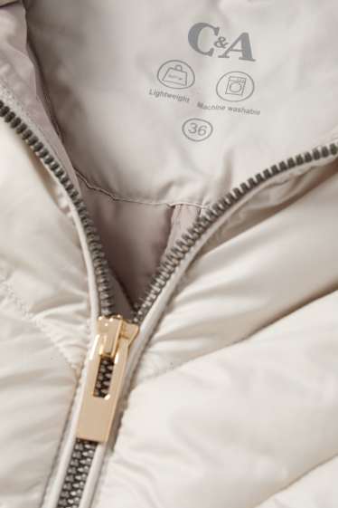 Dona - Jaqueta embuatada amb caputxa - gris clar