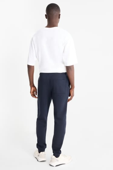 Hommes - Pantalon de jogging - bleu foncé