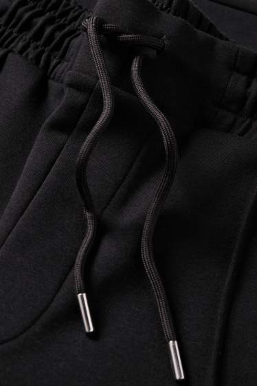 Bărbați - Pantaloni de trening - negru