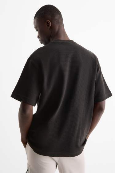 Hommes - T-shirt - relaxed fit - noir