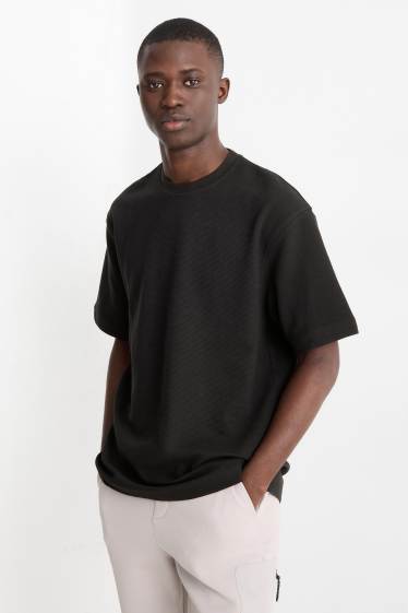 Hommes - T-shirt - relaxed fit - noir
