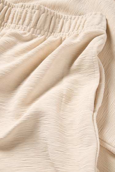 Femmes - Pantalon en jersey - mid waist - regular fit - finition texturée - beige clair