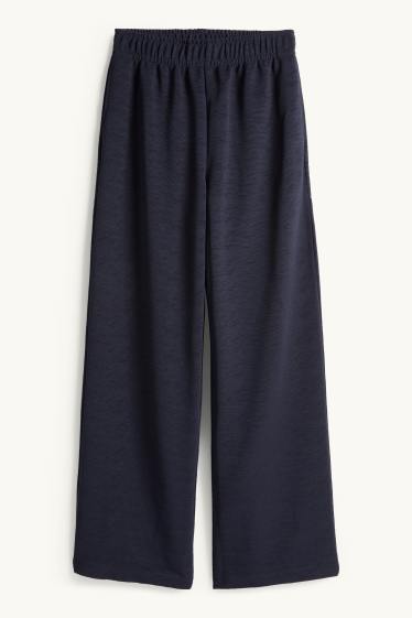 Femmes - Pantalon en jersey - mid waist - regular fit - finition texturée - bleu foncé