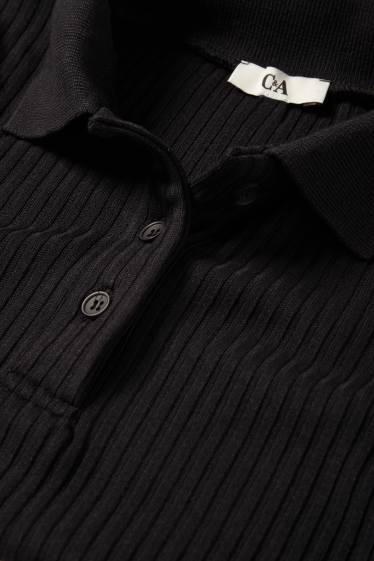 Dona - Polo - slim fit - acanalat - negre