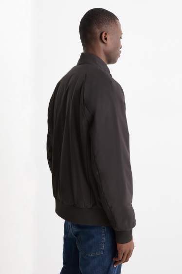 Bărbați - Jachetă matlasată - rezistentă la apă - negru