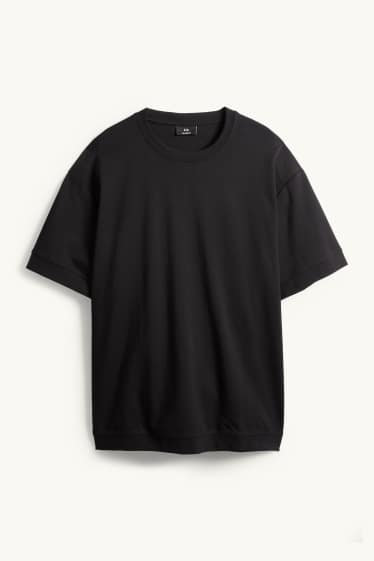 Heren - T-shirt - relaxed fit - zwart