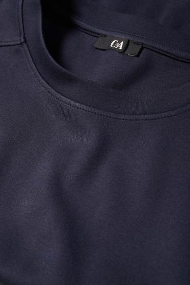 Dona - Dessuadora - oversized - blau fosc