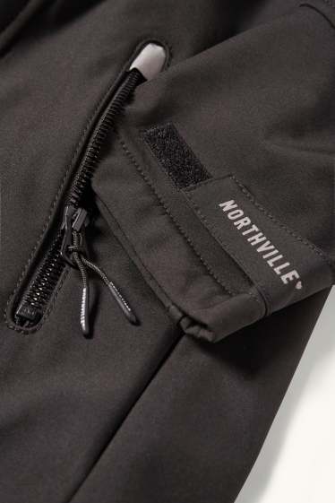 Kinder Mädchen - Softshelljacke mit Kapuze - wasserdicht - schwarz