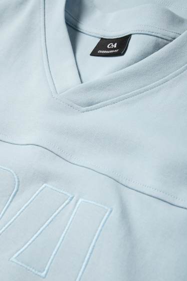 Men - T-shirt - oversized - light blue