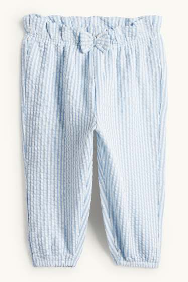 Miminka - dívky - Teplákové kalhoty pro miminka - pruhované - strukturované - bílá / světle modrá