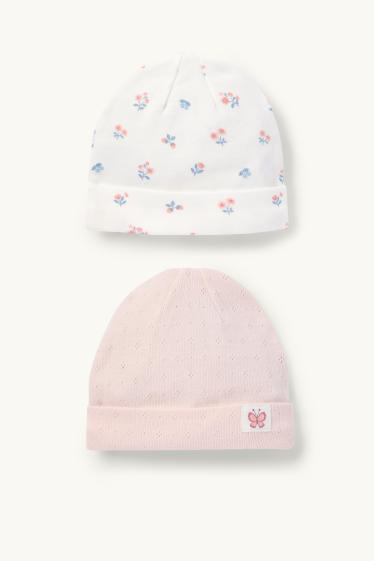 Bébés filles - Lot de 2 - petits fleurs et papillon - bonnet bébé - blanc / rose