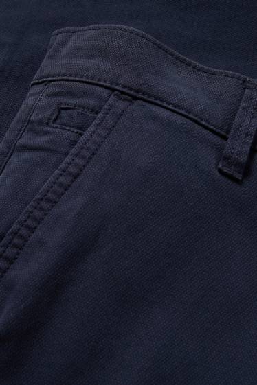 Hommes - Pantalon de cargo - tapered fit - finition texturée - bleu foncé