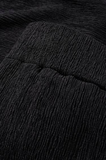 Mujer - Pantalón de jersey - mid waist - wide leg - con textura - negro