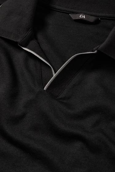 Heren - Poloshirt met lange mouwen - regular fit - zwart