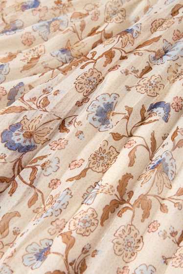 Kinderen: meisjes - Bloem - plissébroek - glanseffect - beige