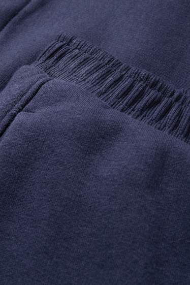 Dámské - Teplákové kalhoty - tmavomodrá