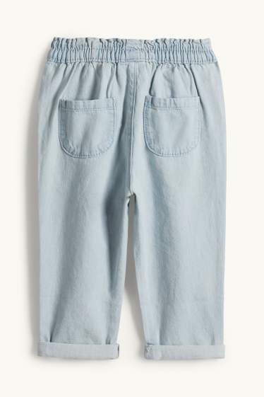 Nadó nena - Floretes - texans per a nadó - texà blau clar