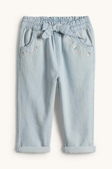 Nadó nena - Floretes - texans per a nadó - texà blau clar