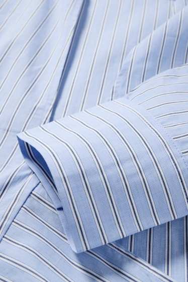 Dames - Blouse met V-hals en geknoopt detail - gestreept - lichtblauw