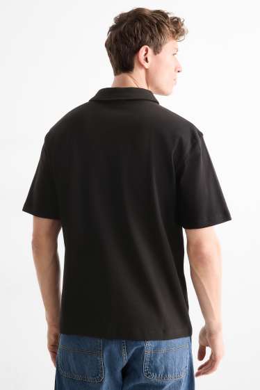 Heren - Poloshirt - relaxed fit - zwart