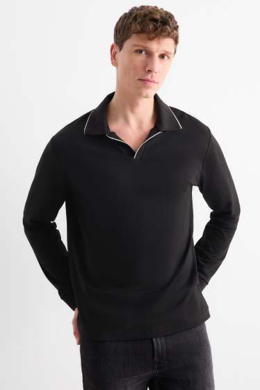 Heren - Poloshirt met lange mouwen - regular fit - zwart