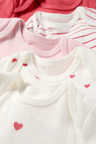 Baby: meisjes - Set van 5 - hartje - rompertje - donker rose