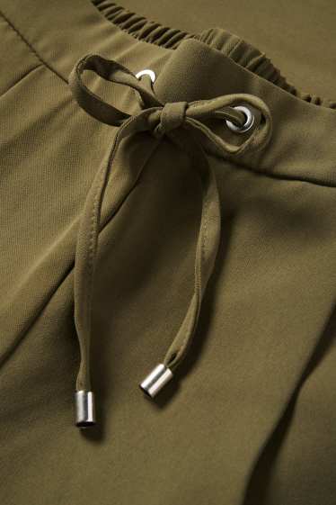 Dona - Pantalons de tela - mid waist - tapered fit - verd fosc