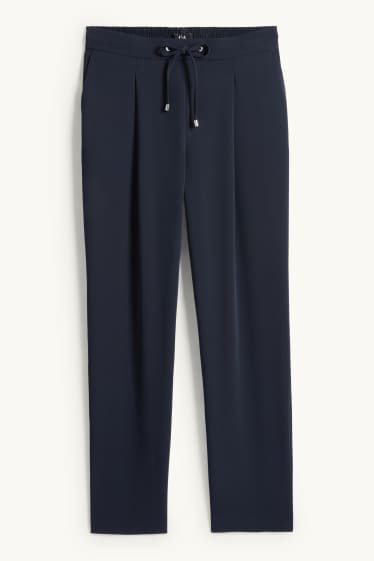 Dona - Pantalons de tela - mid waist - tapered fit - blau fosc