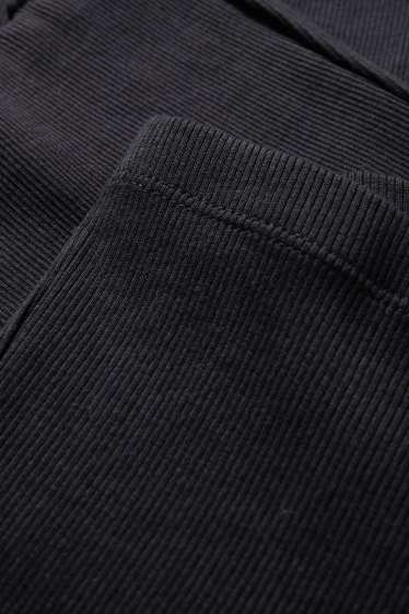 Kinderen: meisjes - Set van 2 - flared legging - ribstof - zwart